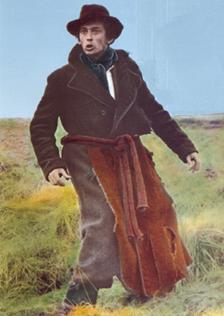 Robert Powell disguised as a road mender in the 1978 film